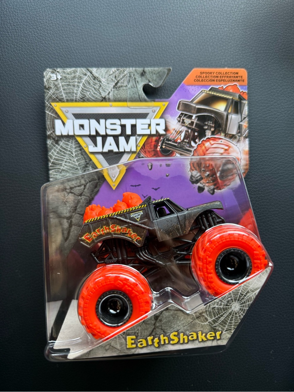 Monster Jam EarthShaker Kids Toy Truck - Black with Bright Orange Wheels